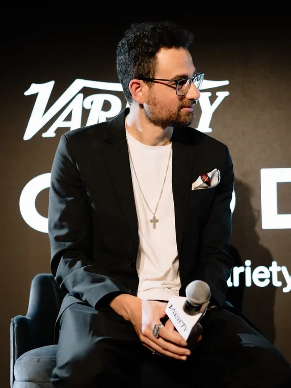 Luke Girgis on stage at the Variety CMO Dinner